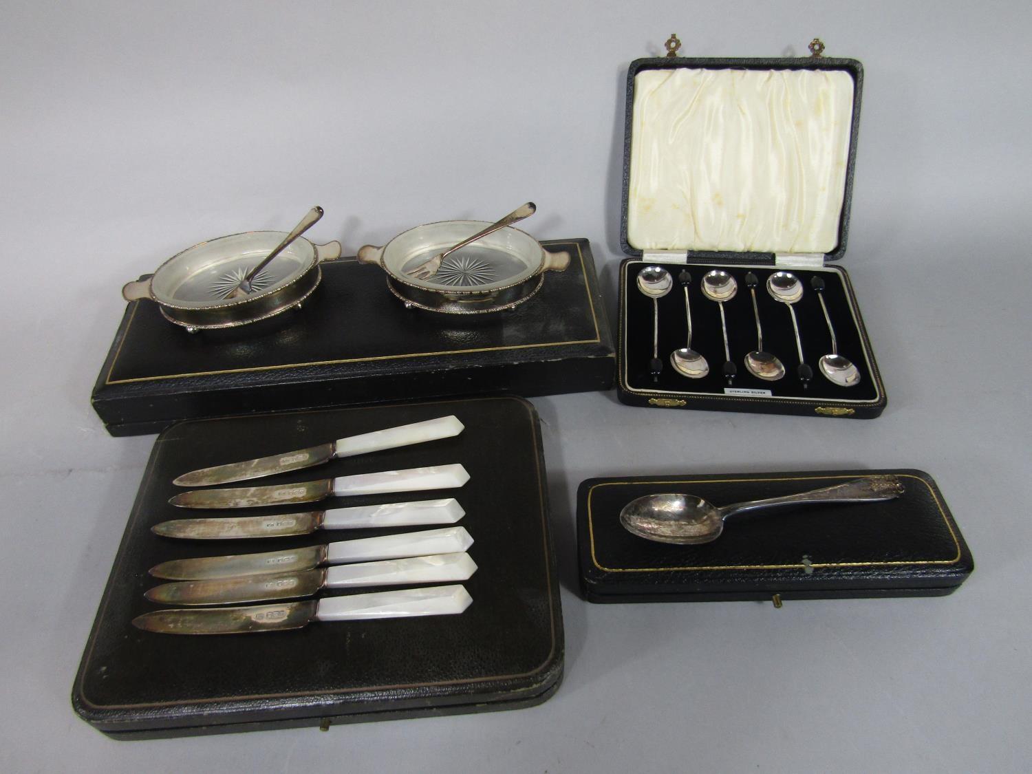 Mixed collection of cased silver sets comprising a cased set of six art deco mother of pearl