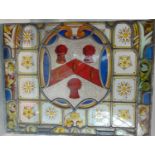 four 19th century or earlier leaded light panels all with armorial detail including a royal coat