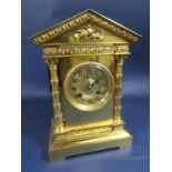 A good quality gilt brass architectural mantle clock, the gilt two train dial with Arabic