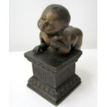 Reproduction bronze study of a child upon a classical square cut column balanced. 19cm