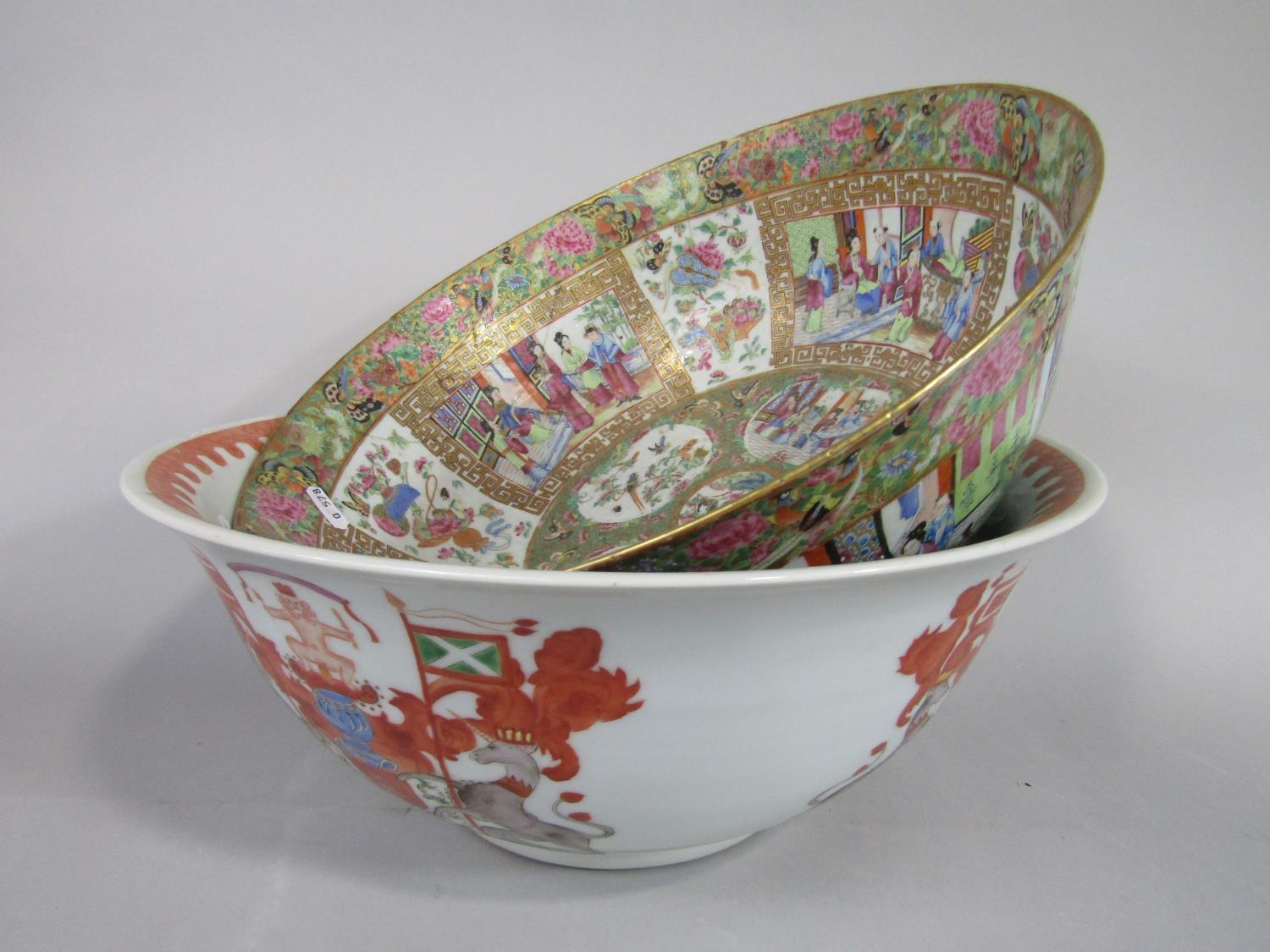 A 19th century Cantonese punch bowl with polychrome painted continuous decoration to the exterior