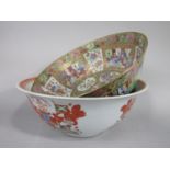 A 19th century Cantonese punch bowl with polychrome painted continuous decoration to the exterior