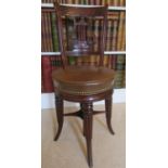 A Regency mahogany harpists or music chair, the back with lyre shaped splat and further anthemion
