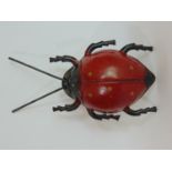 Tinplate clockwork ladybird dated 1911 with forward and sideways action, by Gunthermann, Bavaria,