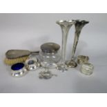 A mixed collection of silver comprising two tapered tulip type vases, a silver lidded scent