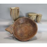A mixed tribal lot to include three skin drums and a further carved softwood dish (4)