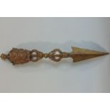 Unusual and interesting tribal cast brass hand spear, the triform top cast with masks, 33 cm long