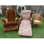 A Georgian style wing armchair with upholstered finish raised on squat cabriole forelegs together
