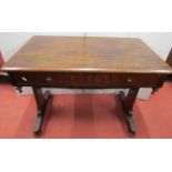 A 19th century mahogany side table with frieze drawer, raised on a stretcher base with turned