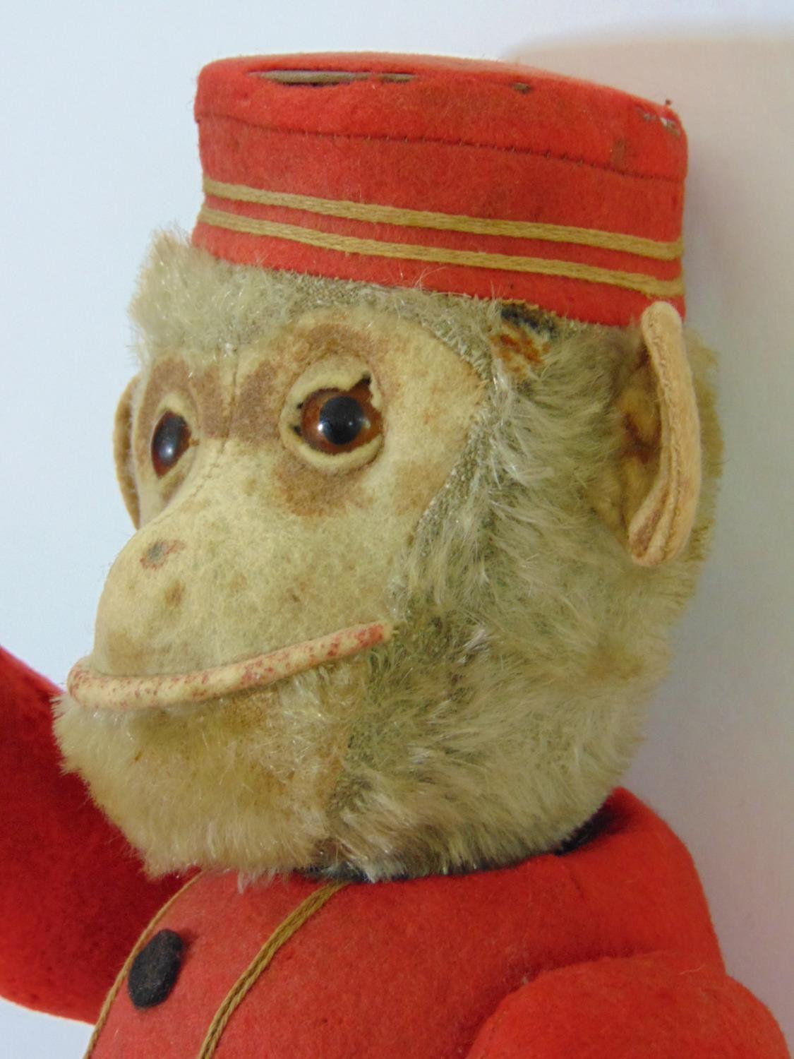 Schucco Bellhop Yes/ No monkey C1920's with brown glass eyes, fur head, felt face, in red and - Image 2 of 11