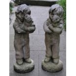 Four matching contemporary partially weathered buff coloured composition stone garden ornaments in