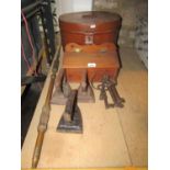 A Victorian tin hat box of oval form with simulated wood grain finish containing three vintage