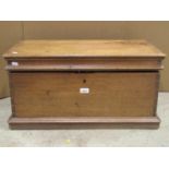 A small hardwood chest with hinged lid, exposed dovetail construction and side carrying handles