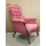 A Victorian mahogany spoonback drawing room chair with showwood frame, upholstered and partially