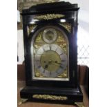 A good quality antique ebonised twin fusee bracket clock, the arched gilt dial with silvered chapter
