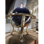 Gem set terrestrial globe upon a brass stand, 47cm high