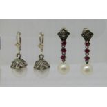 Three pairs of contemporary silver pearl drop earrings to include an Art Deco style pair set with