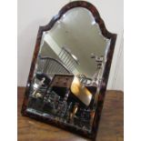 A good quality 19th century tortoiseshell wall or dressing table mirror with arched outline, easel