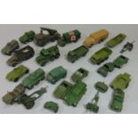A collection of Dinky unboxed military vehicles, including tanks, ferret scout car, army wagons,