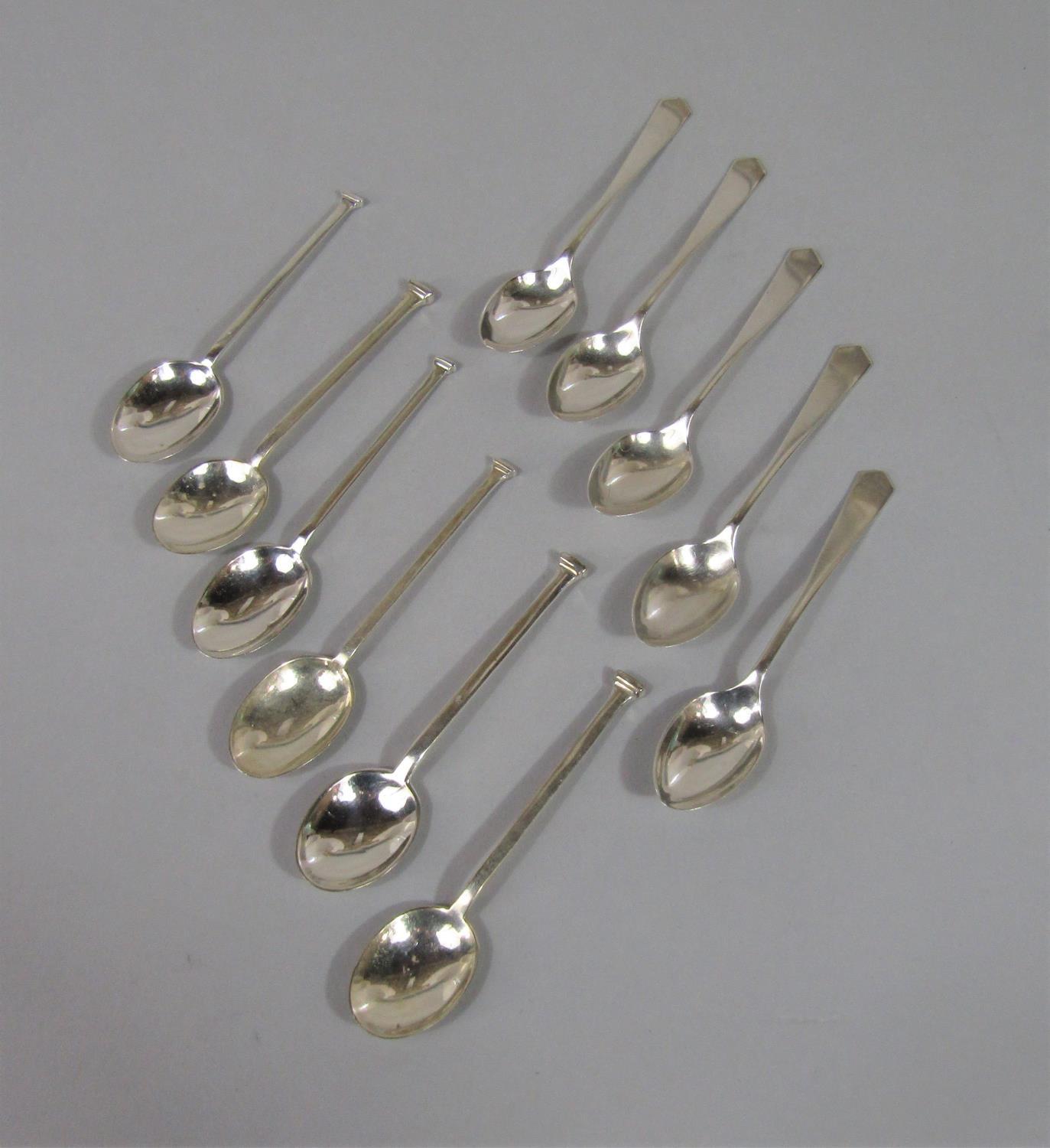 Set of six silver knopped coffee bean spoons together with a further set of five coffee bean spoons,