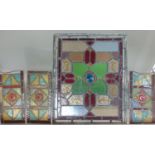 19th century leaded light panel with geometric design, 50cm x 42cm, together with three further 19th