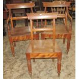 A pair of 19th century mahogany open elbow chairs with curved bar splats, over solid seats, raised