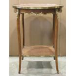 A two tier occasional table with floral marquetry inlaid top, shaped brass trim slender tapered
