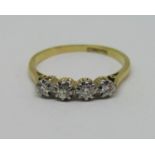 18ct four stone diamond ring, size R, 2.9g