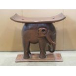 A vintage carved African Ashanti stool in the form of a standing elephant
