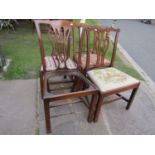 Four various Georgian mahogany dining chairs, one with well carved splat and cresting rails with