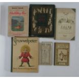 A quantity of antique children's books to include Little Ann, A Book, Mother Goose and Under The