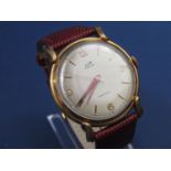 Vintage gent's gold plated Lip Elgiloy Parechoc wristwatch, champagne dial with Arabic and baton