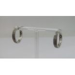 Pair of 9ct white gold hinged hoop earrings, pave set with diamonds, 5.9g total