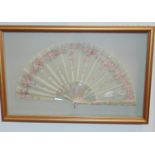 Impressive fan mounted in glazed presentation case, with mother of pearl and ivory sticks and