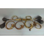 Four brass car horns