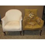 An early 20th century tub chair simply upholstered in white calico and raised on cabriole forelegs