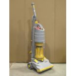 A Dyson DC01 vacuum cleaner