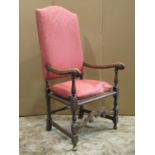 A pair of 1920s Carolean style open armchairs with cane panelled seats, upholstered backs,