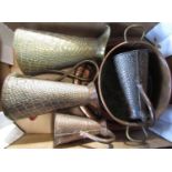 A twin handled copper jam pan, together with various copper and brass snake skin effect jugs and one