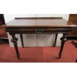 A 19th century oak side or hall table, enclosing a cushion moulded drawer, raised on four turned