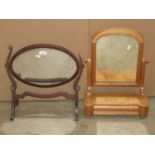 A small Victorian satin walnut/birch toilet mirror with shaped platform base incorporating a