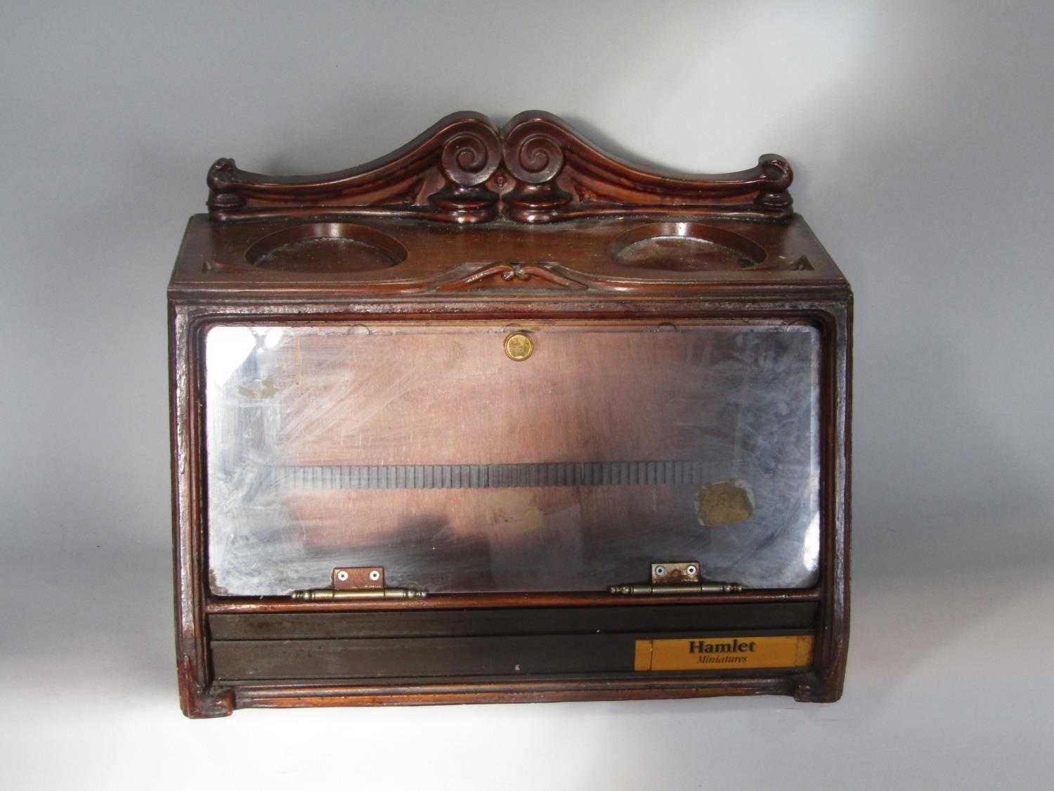 A good vintage table top cigar cabinet, with hinged glass front and various carvings and