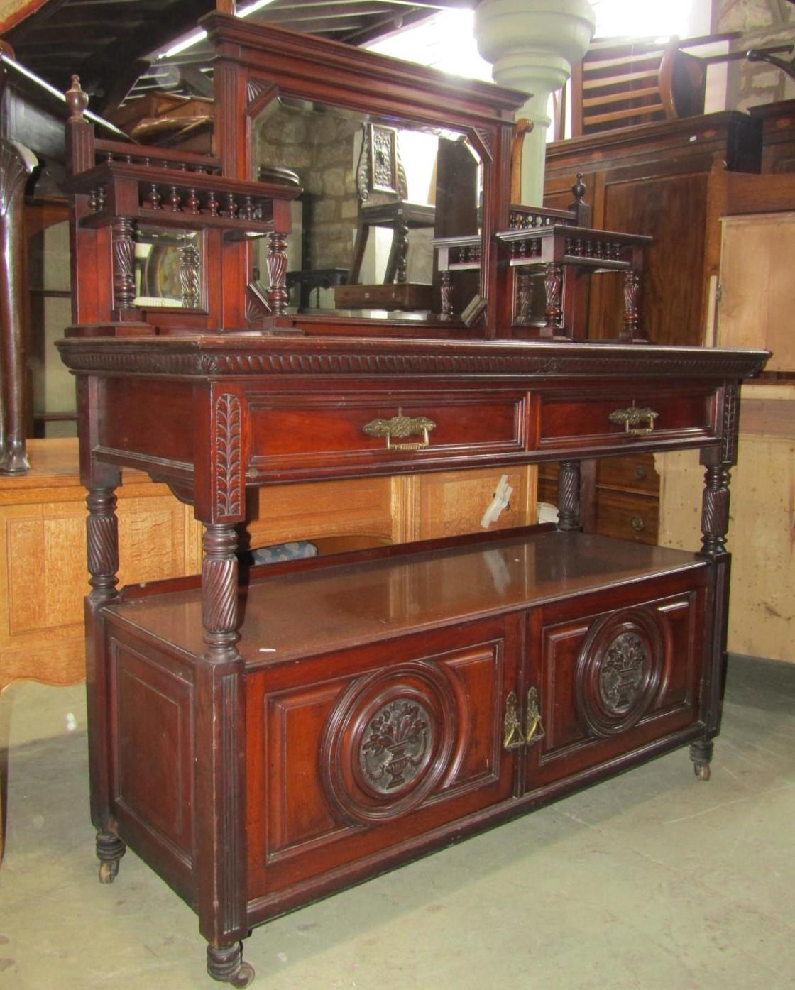 A good quality late Victorian/Edwardian walnut buffet, the raised back incorporating three