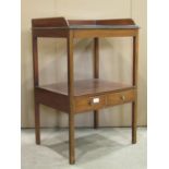 A small 19th century mahogany two tier washstand with shallow three quarter gallery, the lower
