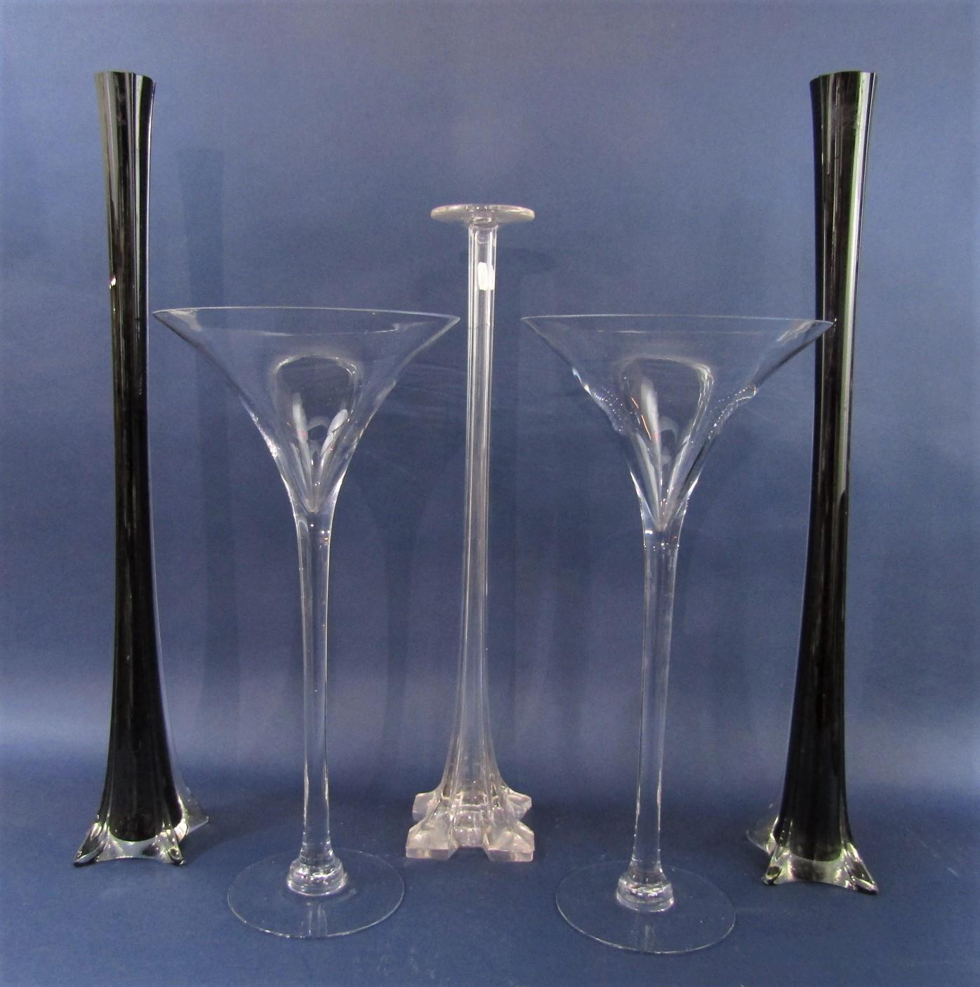 Two oversized glass martini type glasses/floor vases, 50cm high, together with a further pair of