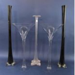 Two oversized glass martini type glasses/floor vases, 50cm high, together with a further pair of