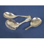 Three silver caddy spoons to include one with engraved scales to the bowl, another with fancy Albany
