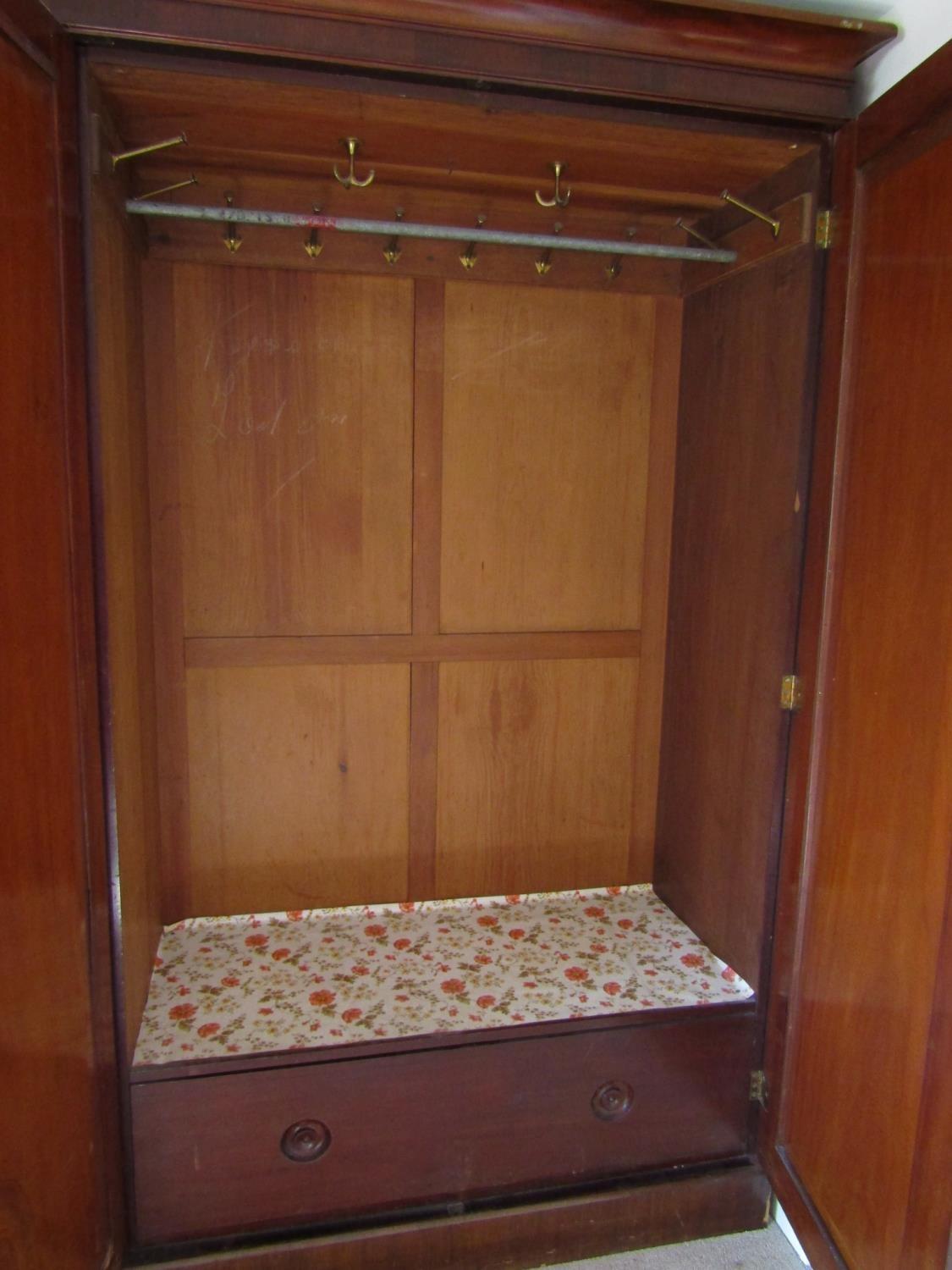 A good quality Victorian mahogany triple wardrobe, the central mirror panelled door flanked by two - Image 4 of 6