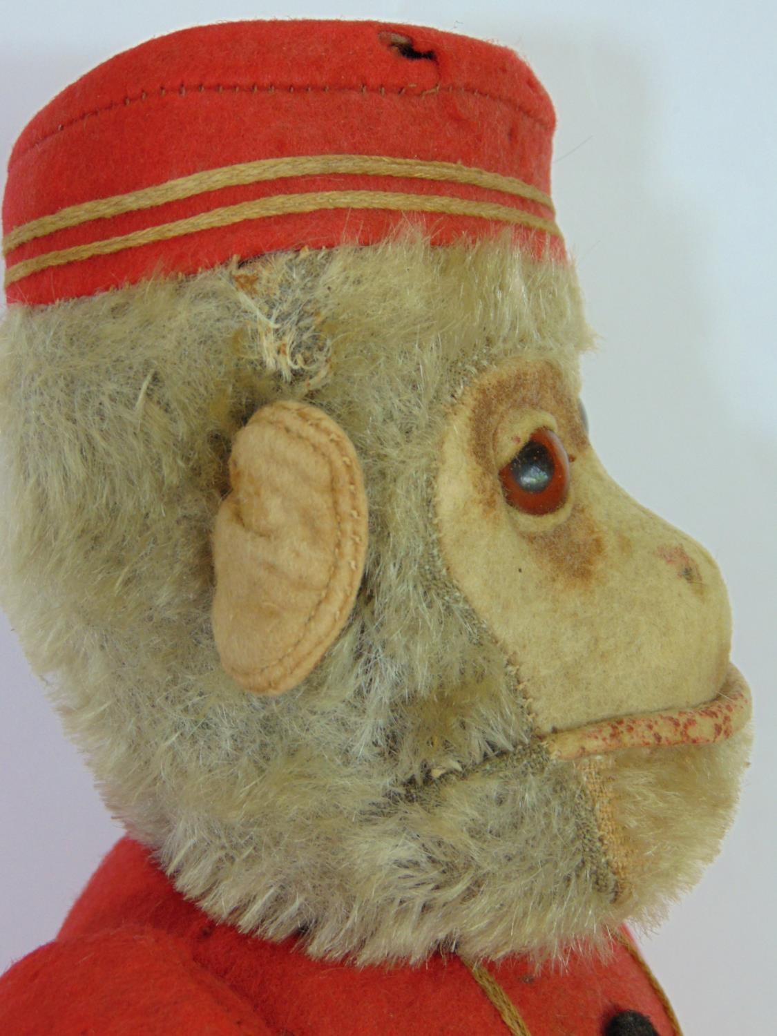 Schucco Bellhop Yes/ No monkey C1920's with brown glass eyes, fur head, felt face, in red and - Image 5 of 11