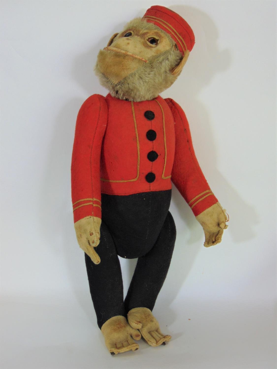 Schucco Bellhop Yes/ No monkey C1920's with brown glass eyes, fur head, felt face, in red and - Image 9 of 11